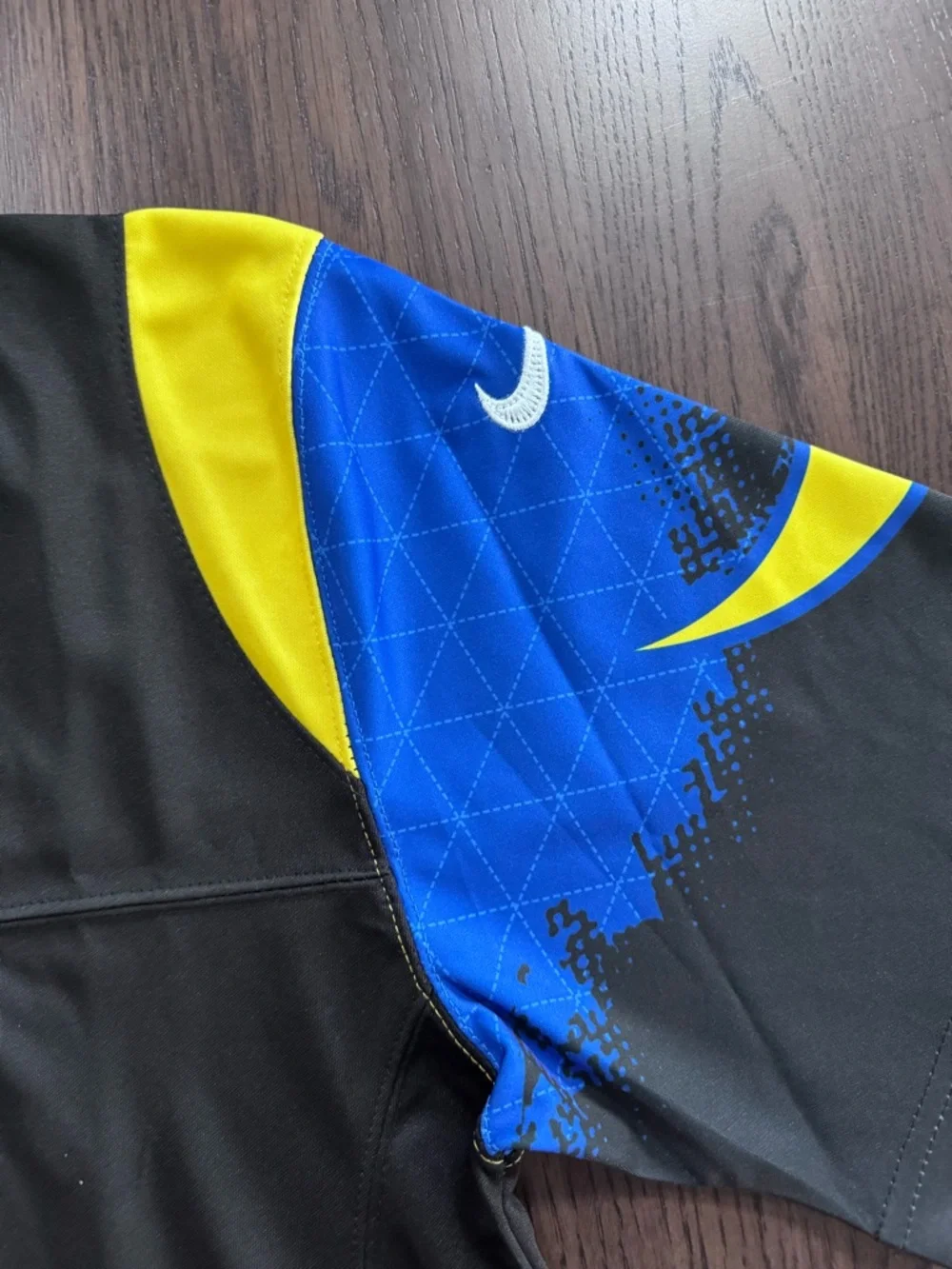 Nike Los Angeles Rams Black Jersey with Blue and Yellow Accents #12